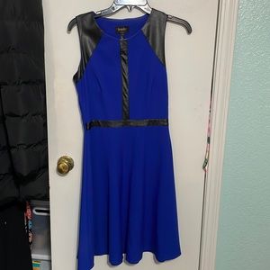 Brand: Laundry by Design. Size 4. Royal blue shirt cocktail dress with leather.